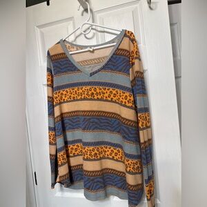 V-Neck Orange and Blue Animal Print Sew in Love Top